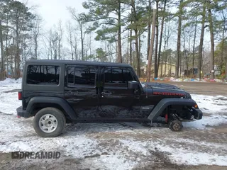 2017 Jeep Wrangler Unlimited Rubicon Recon z VIN 1C4BJWFG4HL723096, wystawiony jako IAAI lot #41393584 z przebiegiem 102 045 mil mil oraz . Historia ofert i sprzedaży dostępna na DreamBid. Obrazek 14.