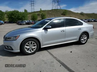 2017 Volkswagen Passat S z VIN 1VWAT7A36HC001657, wystawiony jako Copart lot #57301735 z przebiegiem 110 646 mil mil oraz Czysty tytuł • Clean title. Historia ofert i sprzedaży dostępna na DreamBid. Obrazek 1.