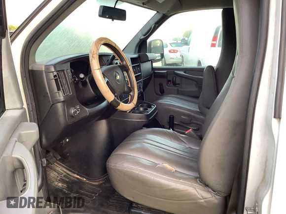 2013 Chevrolet Express Cargo z VIN 1GCSGAFX0D1173242, wystawiony jako IAAI lot #42792060 z przebiegiem 263 409 mil mil oraz . Historia ofert i sprzedaży dostępna na DreamBid. Obrazek 24.
