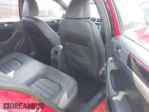 2016 Volkswagen Jetta Sedan 2.0T GLI SE with VIN 3VW5T7AJ0GM357177, listed as a IAAI auction lot 41769034 with 127,324 mi miles. Bid and sale history available at carsss.com. Image 8.