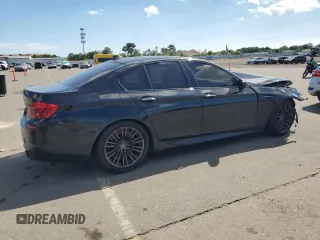 2014 BMW M5 z VIN WBSFV9C53ED594132, wystawiony jako Copart lot #67114384 z przebiegiem 89 020 mil mil oraz Szkoda całkowita • Salvage title. Historia ofert i sprzedaży dostępna na DreamBid. Obrazek 3.