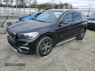 2017 BMW X1 xDrive28i with VIN WBXHT3C37H5F76447, listed as a Copart auction lot 67991792 with 84,189 mi miles. Bid and sale history available at carsss.com. Image 1.