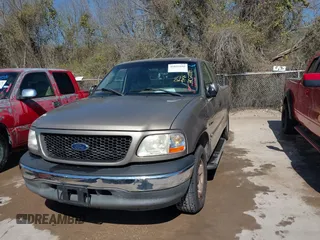 2002 Ford F-150 XL with VIN 1FTRX17242NA02789, listed as a IAAI auction lot 41832186 with 262,253 mi miles. Bid and sale history available at carsss.com. Image 6.