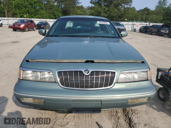 1997 Mercury Grand Marquis GS z VIN 2MELM74W2VX663313, wystawiony jako Copart lot #59539665 z przebiegiem 260 024 mil mil oraz Czysty tytuł • Clean title. Historia ofert i sprzedaży dostępna na DreamBid. Obrazek 5.
