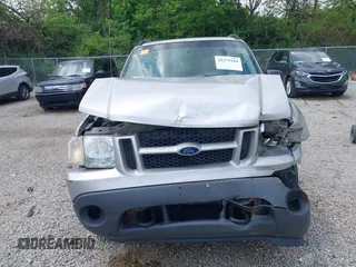 2005 Ford Explorer Sport Trac XLS z VIN 1FMZU77K55UB51889, wystawiony jako IAAI lot #42279164 z przebiegiem 210 081 mil mil oraz . Historia ofert i sprzedaży dostępna na DreamBid. Obrazek 12.