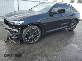 2022 BMW X4 M z VIN 5YM23EC02N9K93385, wystawiony jako Copart lot #53954854 z przebiegiem 17 189 mil mil oraz . Historia ofert i sprzedaży dostępna na DreamBid. Obrazek 1.