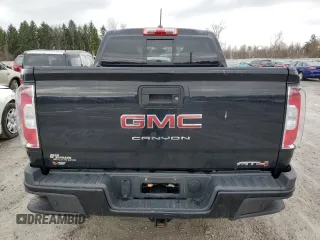 2022 GMC Canyon 4WD AT4 w/Leather with VIN 1GTG6FEN5N1279158, listed as a Copart auction lot 50958545 with 34,569 mi miles and Salvage Title. Bid and sale history available at carsss.com. Image 6.