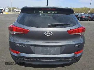 2018 Hyundai Tucson SE z VIN KM8J2CA49JU792947, wystawiony jako Copart lot #52633895 z przebiegiem 75 690 mil mil oraz Tytuł czysty. Historia ofert i sprzedaży dostępna na DreamBid. Obrazek 6.