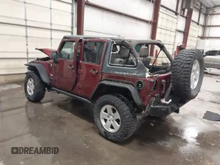 2007 Jeep Wrangler Unlimited Sahara z VIN 1J4GA59157L218278, wystawiony jako IAAI lot #41871773 z przebiegiem 145 992 mil mil oraz . Historia ofert i sprzedaży dostępna na DreamBid. Obrazek 3.