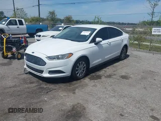 2016 Ford Fusion S with VIN 3FA6P0G79GR163447, listed as a IAAI auction lot 41879027 with 229,957 mi miles. Bid and sale history available at carsss.com. Image 2.