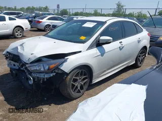 2016 Ford Focus SE with VIN 1FADP3F27GL385739, listed as a IAAI auction lot 42400329 with 114,331 mi miles and . Bid and sale history available at DreamBid. Image 18.