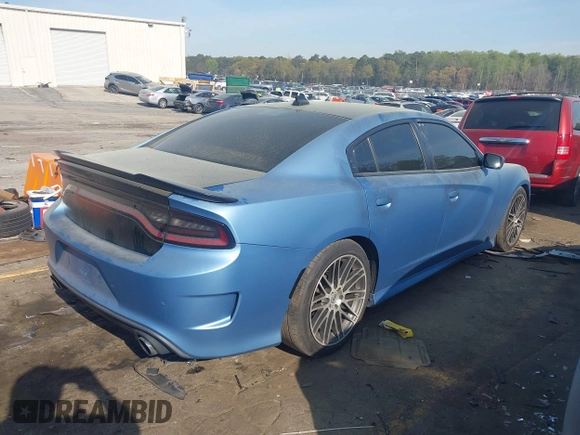 2019 Dodge Charger Scat Pack with VIN 2C3CDXGJ0KH613053, listed as a IAAI auction lot 41908658 with 85,000 mi miles and . Bid and sale history available at DreamBid. Image 4.