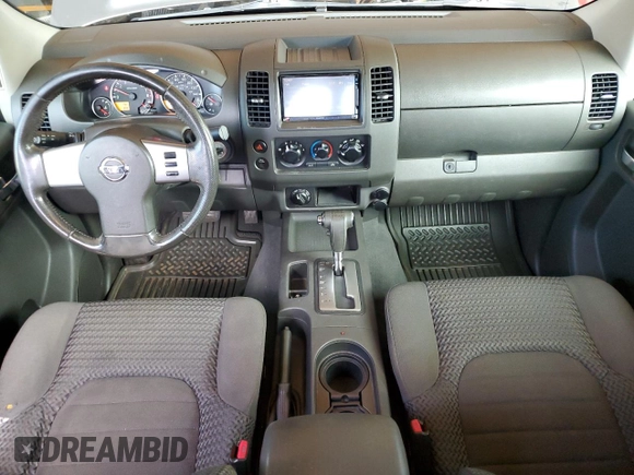2007 Nissan Frontier Nismo with VIN 1N6AD06W57C439818, listed as a Copart auction lot 61210285 with 174,708 mi miles and Salvage title. Bid and sale history available at DreamBid. Image 8.