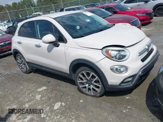 2016 FIAT 500X Trekking Plus with VIN ZFBCFXET7GP404974, listed as a IAAI auction lot 41981822 with 196,005 mi miles and . Bid and sale history available at DreamBid. Image 1.