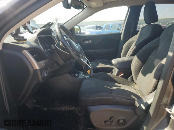 2015 Jeep Cherokee North with VIN 1C4PJMCSXFW582677, listed as a Copart auction lot 67999984 with 220,045 mi miles and Salvage Title. Bid and sale history available at carsss.com. Image 7.