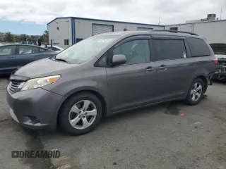 2015 Toyota Sienna LE AAS with VIN 5TDKK3DC1FS577795, listed as a Copart auction lot 66215355 with 197,902 mi miles and Salvage title. Bid and sale history available at DreamBid. Image 1.