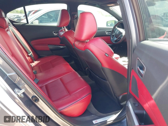 2019 Acura TLX w/A-Spec Pkg z VIN 19UUB2F61KA000932, wystawiony jako IAAI lot #42164064 z przebiegiem 79 080 mil mil oraz . Historia ofert i sprzedaży dostępna na DreamBid. Obrazek 8.