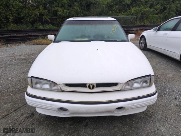 1992 Pontiac Bonneville SSE with VIN 1G2HZ52L5N1321549, listed as a Copart auction lot 74715344 with 0 mi miles and Non Repairable. Bid and sale history available at carsss.com. Image 5.