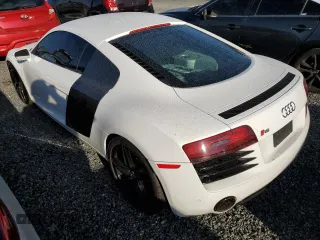 2014 Audi R8 V8 z VIN WUADUAFG5EN000704, wystawiony jako Copart lot #73885864 z przebiegiem Nie podano mil oraz Szkoda całkowita • Salvage title. Historia ofert i sprzedaży dostępna na DreamBid. Obrazek 2.