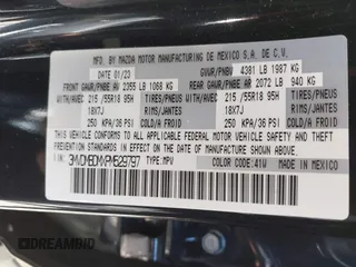 2023 Mazda CX-30 2.5 S Premium Package with VIN 3MVDMBDMXPM529797, listed as a IAAI auction lot 41012225 with 26,354 mi miles. Bid and sale history available at carsss.com. Image 9.
