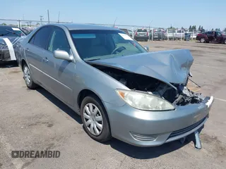 2005 Toyota Camry LE with VIN 4T1BE30K75U637444, listed as a IAAI auction lot 42433657 with 141,682 mi miles and . Bid and sale history available at DreamBid. Image 1.