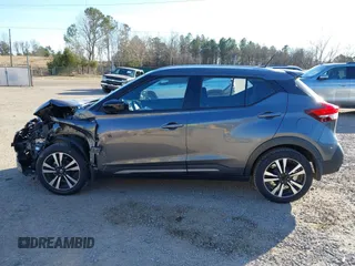 2019 Nissan Kicks S with VIN 3N1CP5CU2KL556291, listed as a IAAI auction lot 41312893 with 51,081 mi miles. Bid and sale history available at carsss.com. Image 14.