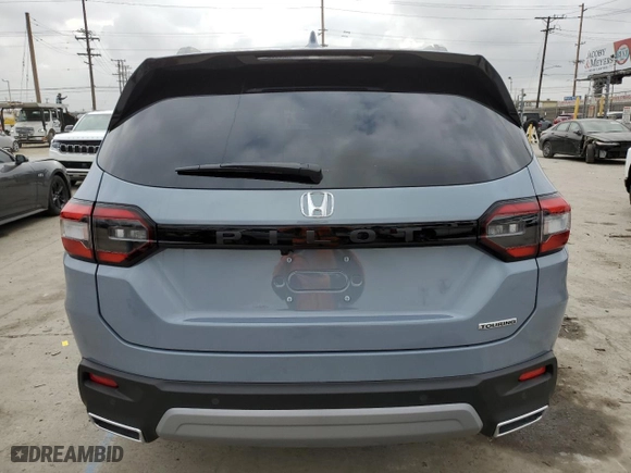 2025 Honda Pilot Touring with VIN 5FNYG2H73SB016693, listed as a Copart auction lot 54366275 with 1,259 mi miles and Salvage Title. Bid and sale history available at carsss.com. Image 6.