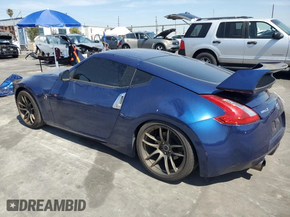 2016 Nissan 370Z z VIN JN1AZ4EH9GM933658, wystawiony jako Copart lot #48760215 z przebiegiem 70 682 mil mil oraz Szkoda całkowita • Salvage title. Historia ofert i sprzedaży dostępna na DreamBid. Obrazek 2.