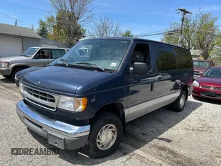 1998 Ford Econoline Passenger XL with VIN 1FMRE11L6WHB65841, listed as a IAAI auction lot 42123953 with 63,138 mi miles. Bid and sale history available at carsss.com. Image 2.