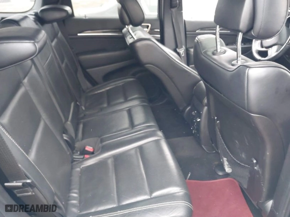 2014 Jeep Grand Cherokee Overland with VIN 1C4RJFCGXEC172008, listed as a IAAI auction lot 41719313 with 164,682 mi miles. Bid and sale history available at carsss.com. Image 8.