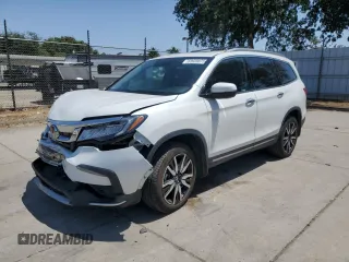 2022 Honda Pilot Touring 8-Passenger with VIN 5FNYF6H9XNB012608, listed as a Copart auction lot 59920875 with 48,656 mi miles and Salvage title. Bid and sale history available at DreamBid. Image 1.