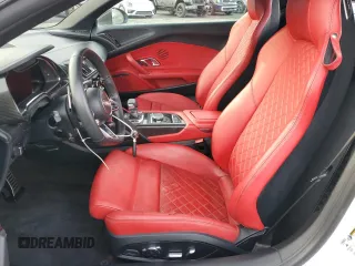 2020 Audi R8 Spyder performance z VIN WUA4BCFX3L7901606, wystawiony jako Copart lot #50161615 z przebiegiem 3 669 mil mil oraz Nie do naprawy • Non repairable. Historia ofert i sprzedaży dostępna na DreamBid. Obrazek 7.