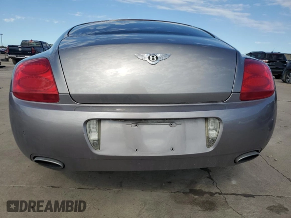 2006 Bentley Continental GT GT z VIN SCBCR63W76C037174, wystawiony jako Copart lot #79240794 z przebiegiem 103 577 mil mil oraz Nie do naprawy. Historia ofert i sprzedaży dostępna na DreamBid. Obrazek 6.