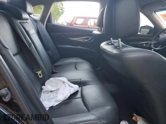 2015 Infiniti Q70 with VIN JN1BY1AP6FM540346, listed as a Copart auction lot 56942445 with 96,962 mi miles and Salvage title. Bid and sale history available at DreamBid. Image 10.