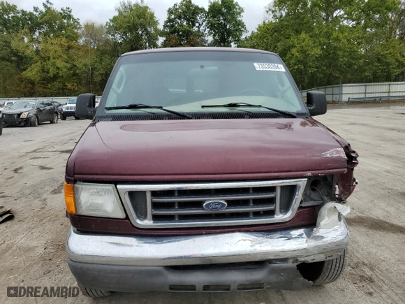 2004 Ford Econoline Wagon XL with VIN 1FBNE31L74HA85481, listed as a Copart auction lot 73530394 with 166,668 mi miles and Salvage Title. Bid and sale history available at carsss.com. Image 5.