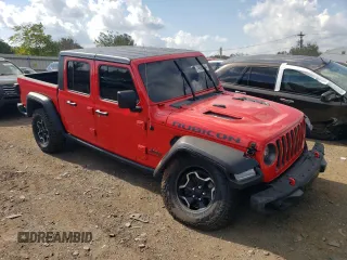 2022 Jeep Gladiator Rubicon with VIN 1C6JJTBGXNL111178, listed as a Copart auction lot 74686344 with 30,587 mi miles and Salvage title. Bid and sale history available at DreamBid. Image 4.