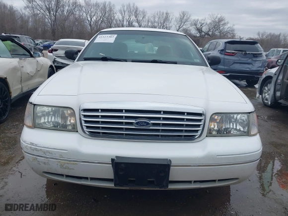 2005 Ford Crown Victoria LX with VIN 2FAFP74WX5X105415, listed as a IAAI auction lot 41523383 with 119,222 mi miles. Bid and sale history available at carsss.com. Image 12.