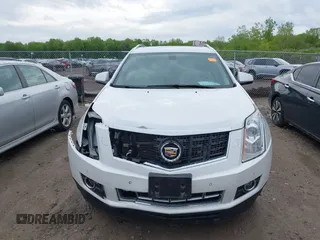 2014 Cadillac SRX Performance Collection with VIN 3GYFNCE34ES519059, listed as a IAAI auction lot 42237351 with 80,578 mi miles and . Bid and sale history available at DreamBid. Image 13.
