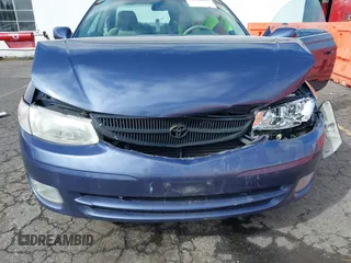 1999 Toyota Solara SE with VIN 2T1CF22P5XC163759, listed as a IAAI auction lot 41922973 with 146,042 mi miles. Bid and sale history available at carsss.com. Image 6.