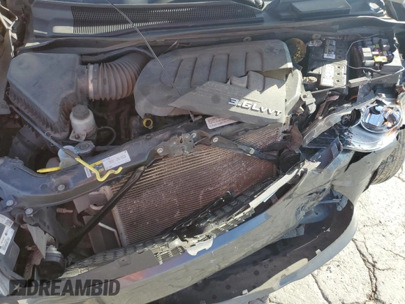 2015 Dodge Grand Caravan American Value with VIN 2C4RDGBG6FR603659, listed as a Copart auction lot 52385735 with 209,818 mi miles and Salvage Title. Bid and sale history available at DreamBid. Image 12.