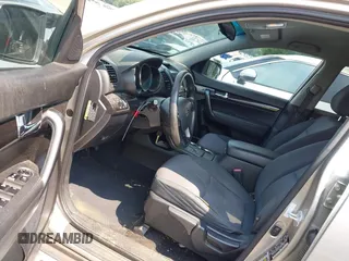 2013 Kia Sorento LX with VIN 5XYKT3A64DG357542, listed as a IAAI auction lot 42402188 with 171,648 mi miles and . Bid and sale history available at DreamBid. Image 5.