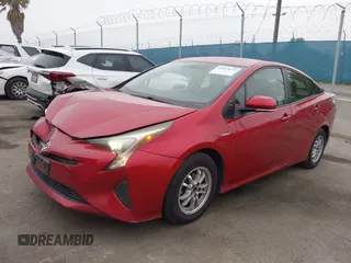 2016 Toyota Prius Two z VIN JTDKBRFU4G3531941, wystawiony jako IAAI lot #42023633 z przebiegiem 249 098 mil mil oraz . Historia ofert i sprzedaży dostępna na DreamBid. Obrazek 2.