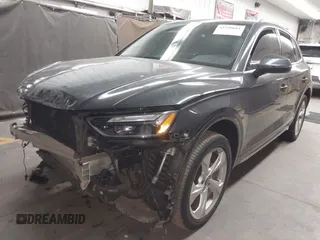 2021 Audi Q5 Premium Plus z VIN WA1BAAFY6M2130300, wystawiony jako IAAI lot #42250661 z przebiegiem 49 147 mil mil oraz . Historia ofert i sprzedaży dostępna na DreamBid. Obrazek 2.