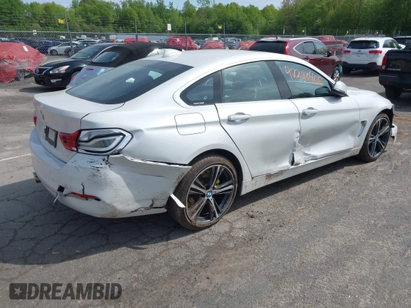 2019 BMW 4 Series 430i xDrive z VIN WBA4J3C55KBL08387, wystawiony jako IAAI lot #42248405 z przebiegiem 115 017 mil mil oraz . Historia ofert i sprzedaży dostępna na DreamBid. Obrazek 4.