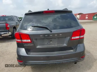 2019 Dodge Journey SE with VIN 3C4PDCBBXKT860142, listed as a IAAI auction lot 42126997 with 101,675 mi miles and . Bid and sale history available at DreamBid. Image 16.
