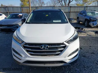 2017 Hyundai Tucson Value with VIN KM8J33A28HU533047, listed as a IAAI auction lot 41853087 with 74,238 mi miles. Bid and sale history available at carsss.com. Image 12.