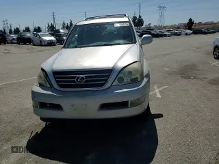 2004 Lexus GX 470 with VIN JTJBT20X640052213, listed as a Copart auction lot 52708415 with 390,451 mi miles and Salvage Title. Bid and sale history available at carsss.com. Image 12.