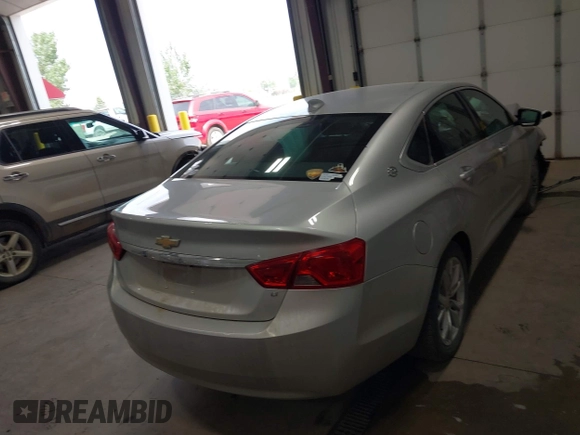 2016 Chevrolet Impala LT with VIN 2G1105SA1G9162946, listed as a IAAI auction lot 42704246 with 156,205 mi miles and . Bid and sale history available at DreamBid. Image 4.
