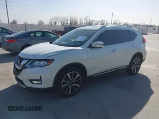 2018 Nissan Rogue SV with VIN JN8AT2MT4JW487069, listed as a IAAI auction lot 41704570 with 98,360 mi miles and . Bid and sale history available at carsss.com. Image 17.