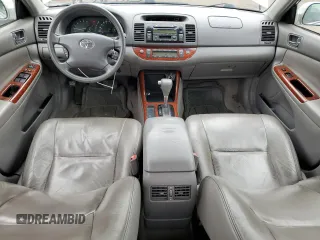 2004 Toyota Camry LE with VIN 4T1BE30K64U323377, listed as a Copart auction lot 58249465 with 274,902 mi miles and Salvage title. Bid and sale history available at DreamBid. Image 8.